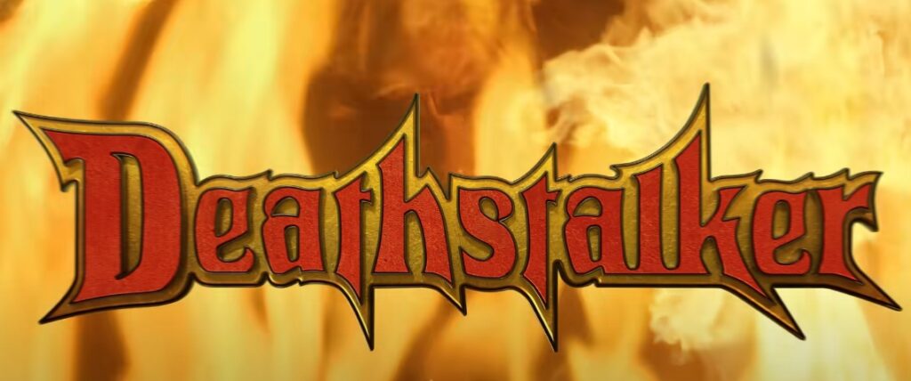 Captura-de-pantalla_30-8-2025_10316_www.youtube.com_-1024x428 Deathstalker resucita: la espada y la carne del cine de culto regresan en un reboot desatado | Ver y descargar torrent
